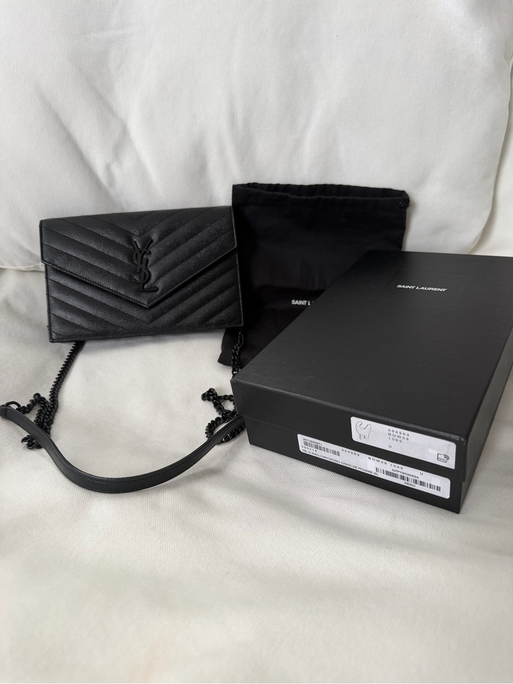 Saint Laurent Envelope Chain Wallet black monochrome design .